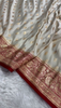 Ivory Banarasi Silk Saree with Golden Zari Buttas & Rich Paisley Border