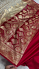 Ivory Banarasi Silk Saree with Golden Zari Buttas & Rich Paisley Border