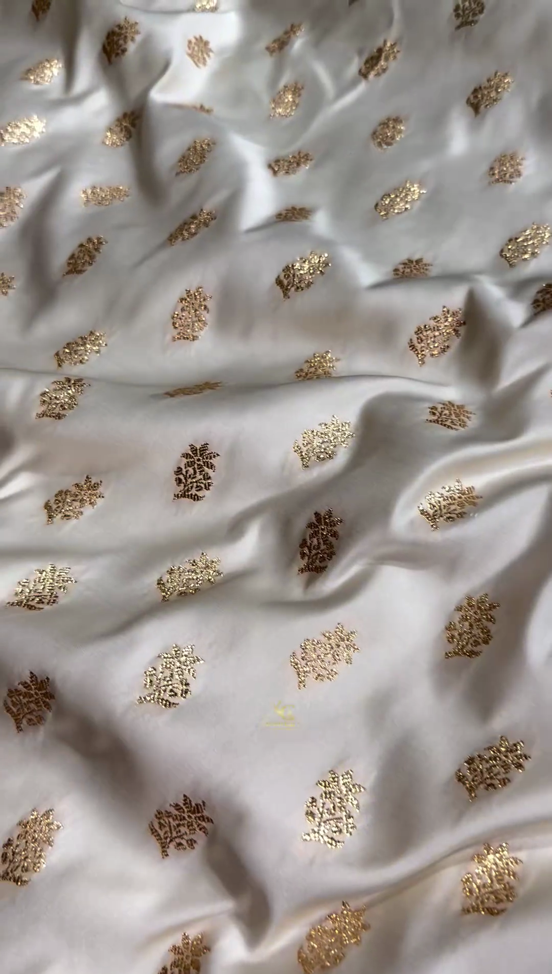 Ivory Banarasi Silk Saree with Golden Zari Buttas & Rich Paisley Border