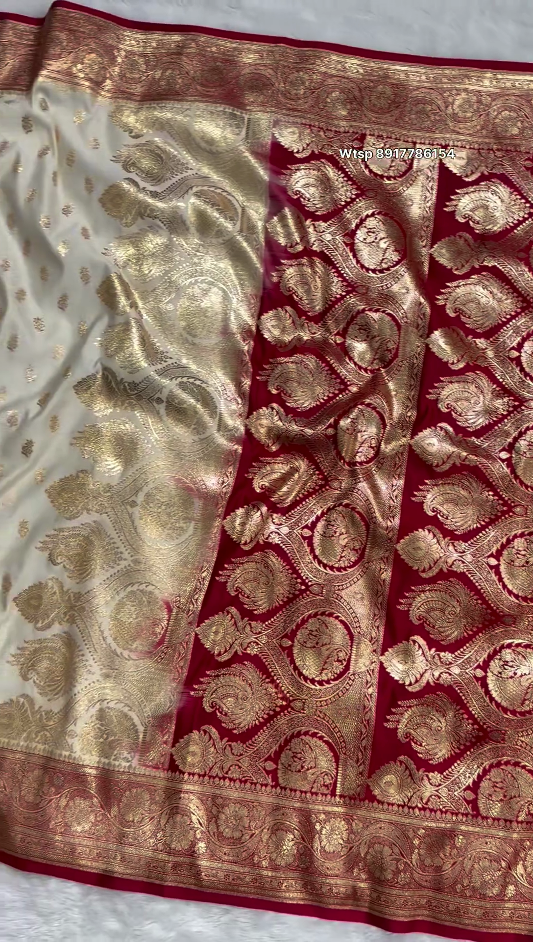 Ivory Banarasi Silk Saree with Golden Zari Buttas & Rich Paisley Border