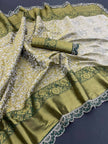 Vasundi - Green Kanjivaram Silk Saree with Royal Blue Zari Border